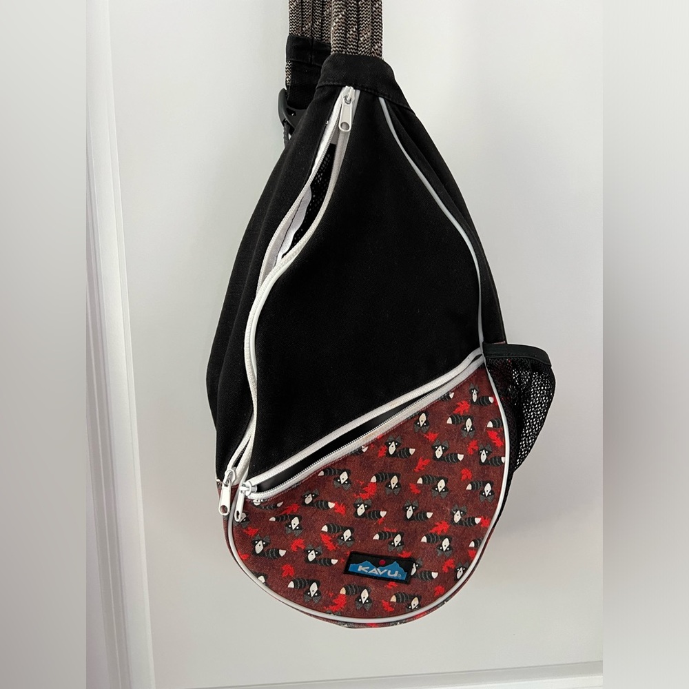 KAVU Paxton sling bag, used good condition raccoons